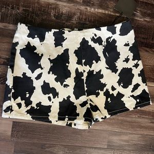 Cow print denim shorts